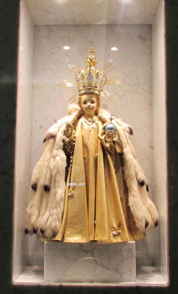 Infant Jesus of Prague dressed in his Christmas Vestment.
